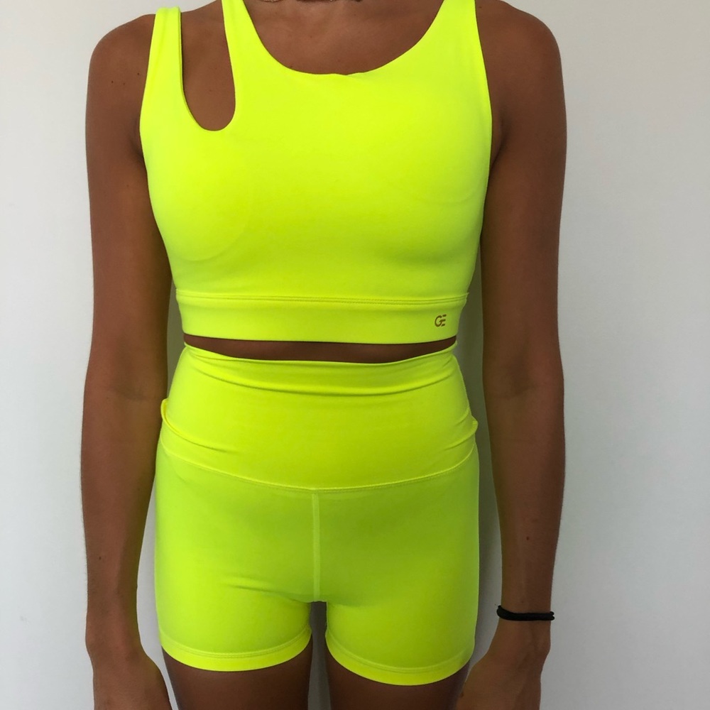 Gold elite neon yellow sports bra and shorts